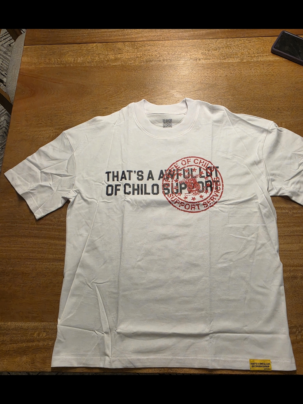 White Short Sleeve Graphic Tee with Red Seal Accent